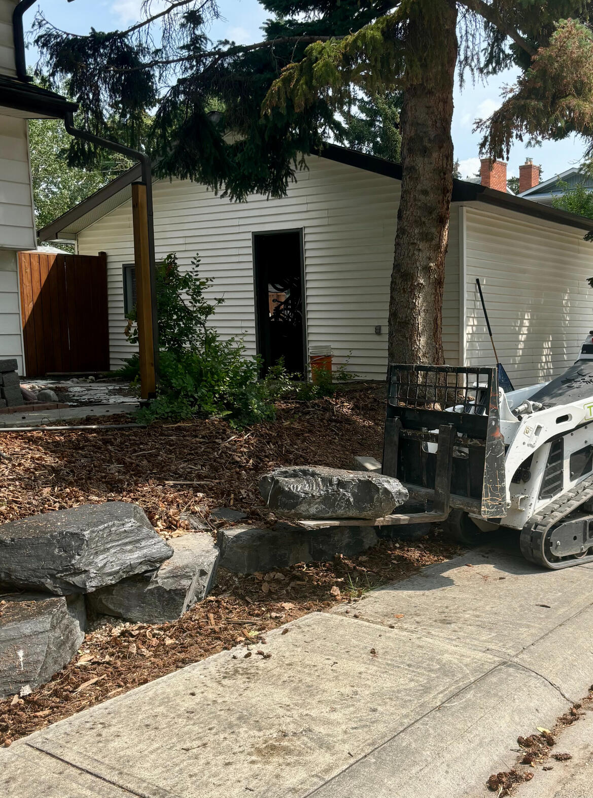 Residential Calgary neighborhood with Task360 branding promoting handyman, tech, and yard services.”